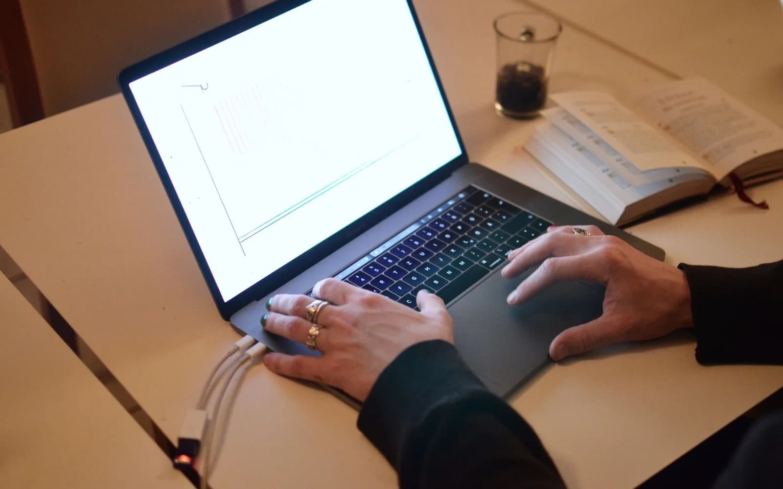 Editorial photograph: A Person Using a Laptop